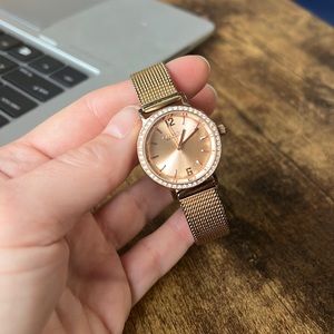 Womens rose gold and diamond watch Caravelle